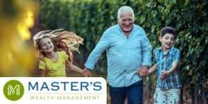 A grandfather skips, hand-in-hand, with two children.