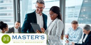 High-income professionals reviewing tax changes on a clipboard together, with other professionals in business attire, men and women, seated at a conference table behind them.