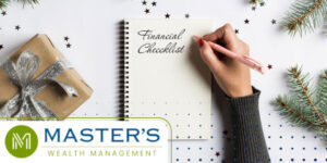 Financial checklist written on festive notebook with a hand about to write on it.